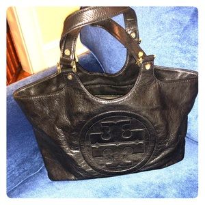 Tory Burch.leather tote. Some wear on the handles.